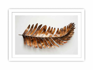 Metallic bronze palm leaf sculpture on a clean white background for modern living rooms decor.