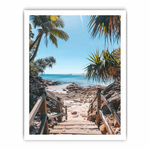 Vertical coastal beach stairs canvas print with palms and ocean for entryway decor.