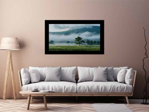 Misty mountain valley photography canvas with lone tree and fog for peaceful living room wall decor.