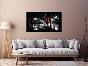 Romantic black and white couple canvas art with red umbrella for modern bedroom decor.