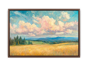 Golden meadow canvas art with pink clouds and blue hills for warm living room decor.