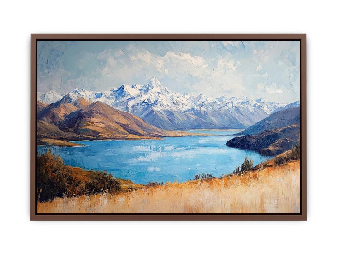 Blue mountain lake canvas art with snowy peaks for refined living room decor.