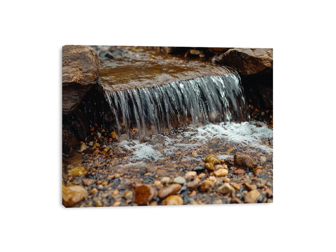 Small creek waterfall photography canvas with rocks and pebbles for peaceful bathroom wall decor.