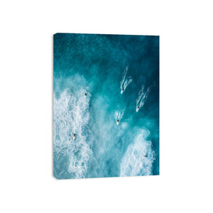 Aerial ocean surfers artwork with turquoise waves for modern coastal wall decor