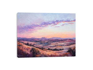Sunset mountain valley canvas art with rose tones for elegant living room decor.