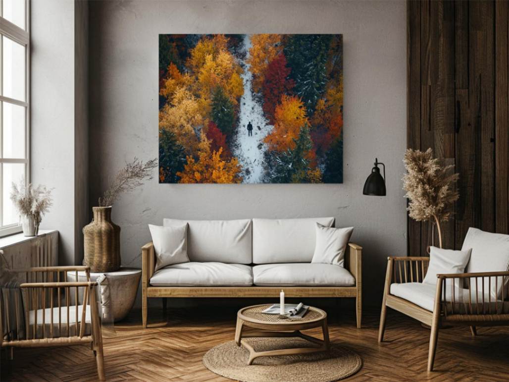 Aerial autumn forest canvas art with lone figure on path for modern living room decor.