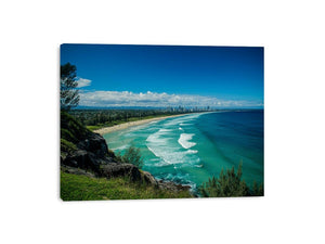 Turquoise coastal beach photography canvas art with skyline for modern living room decor.