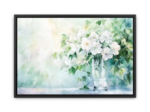 White floral watercolor canvas art in glass vase for soft living room decor.