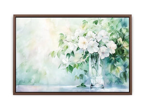 White floral watercolor canvas art in glass vase for soft living room decor.
