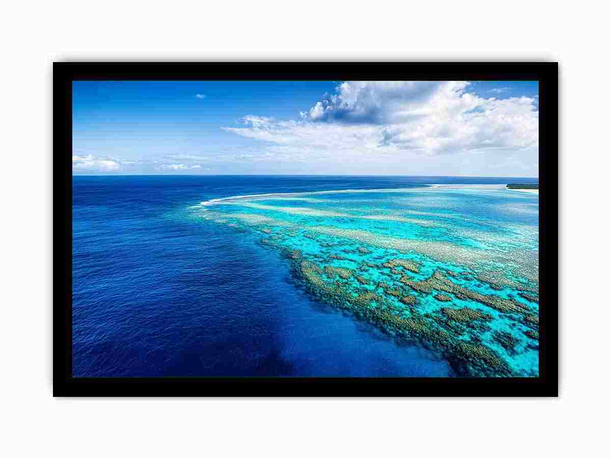 Aerial coral reef canvas photography for coastal living room styling.