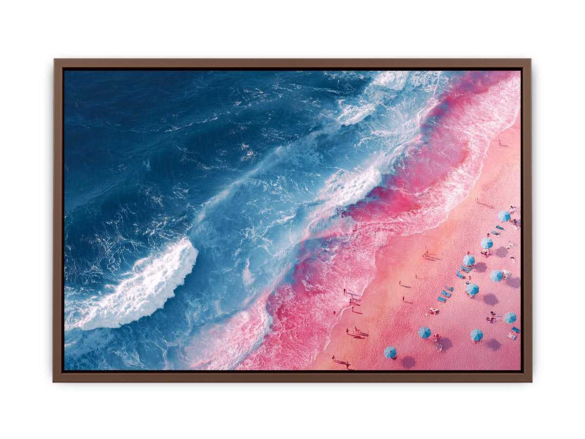 Aerial pink beach and blue ocean canvas art for modern coastal decor.