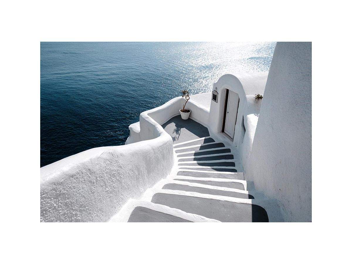 Santorini white steps ocean photography for modern coastal living room decor.