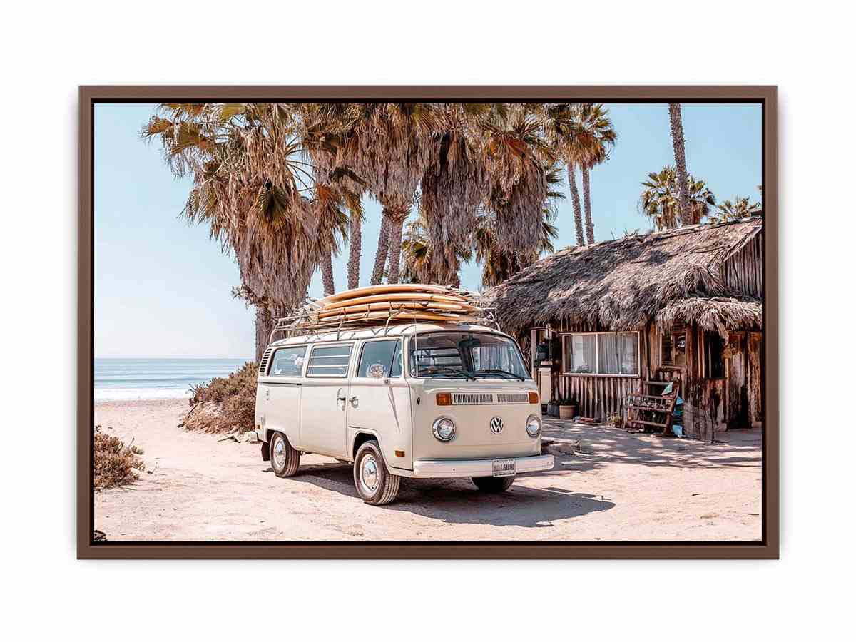 Cream vintage surf van near a palm beach hut for rustic coastal living room decor.