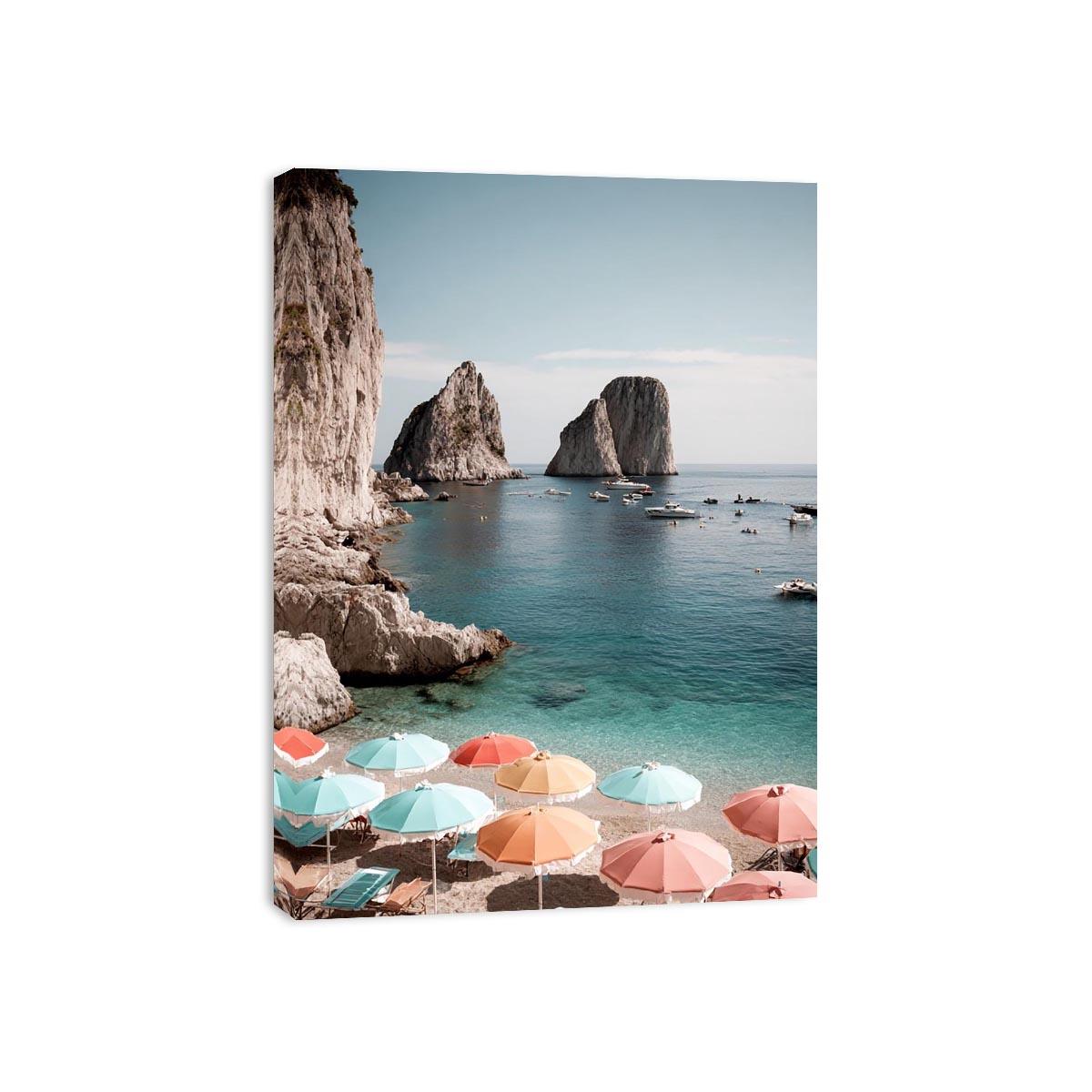 Pastel umbrellas overlooking turquoise sea cliffs for Mediterranean coastal bedroom decor.
