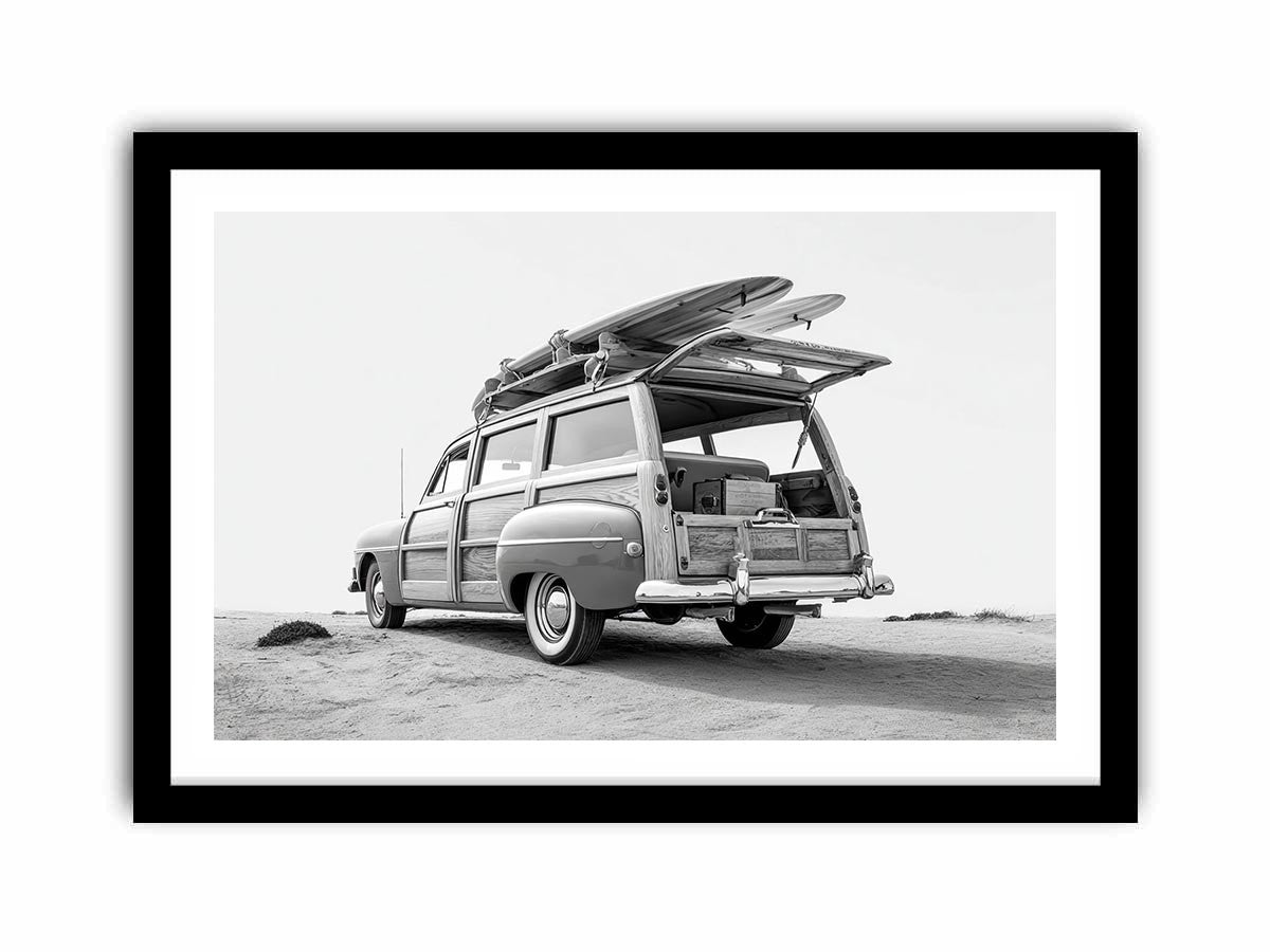 Black and white vintage woody surf wagon with boards for classic coastal wall art.