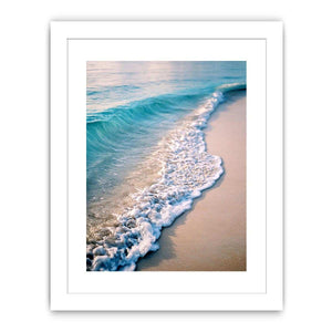 Soft turquoise ocean wave and sandy beach canvas art for coastal living room decor.