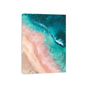 Aerial turquoise beach canvas art with blush sand for modern coastal bedroom decor.