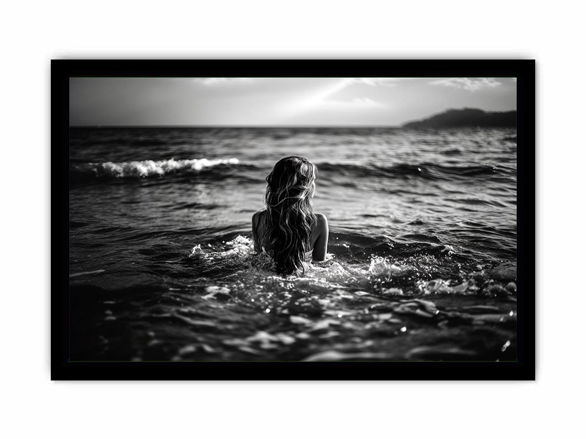 Black and white woman in ocean canvas art for dramatic modern living room decor.