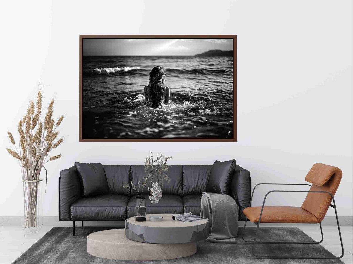 Black and white woman in ocean canvas art for dramatic modern living room decor.