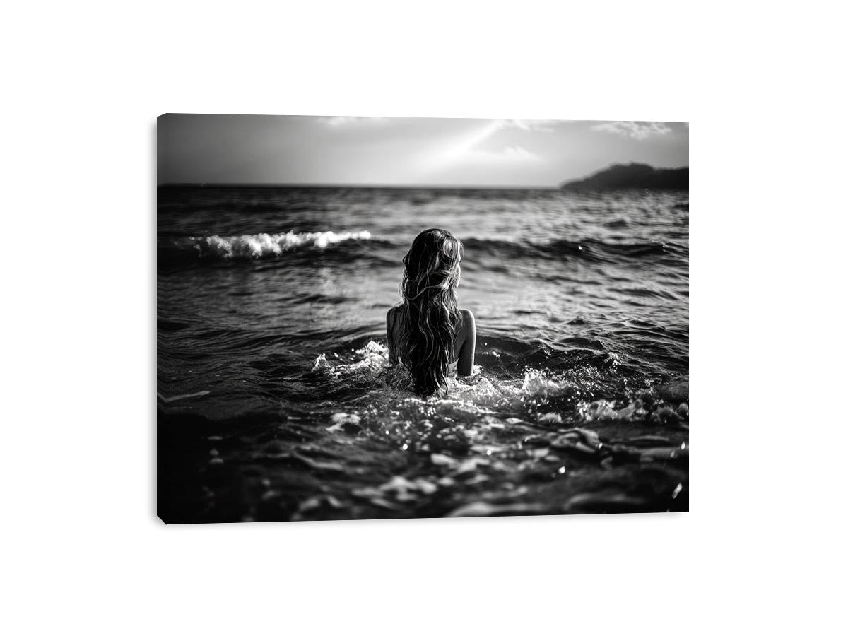 Black and white woman in ocean canvas art for dramatic modern living room decor.