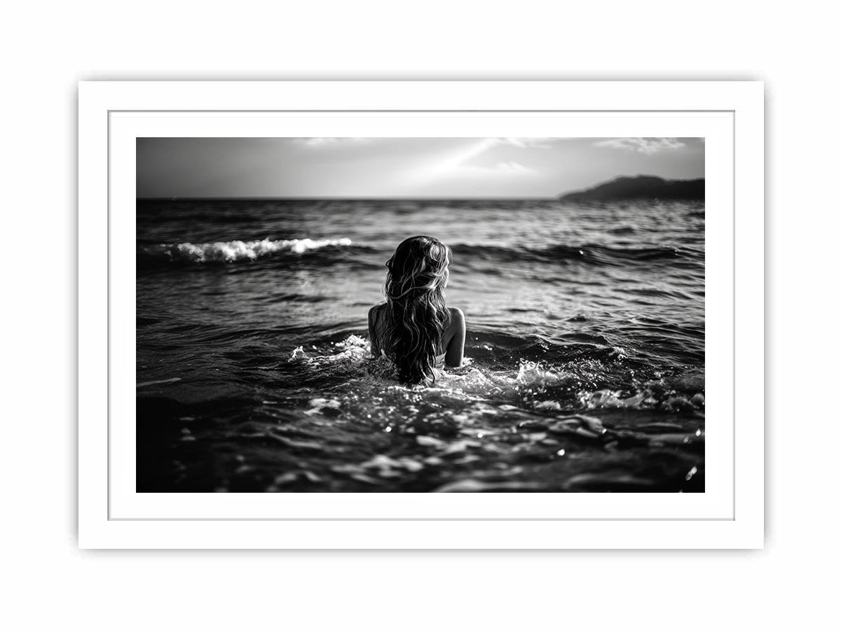 Black and white woman in ocean canvas art for dramatic modern living room decor.
