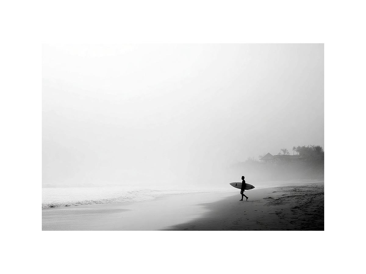 Black and white surfer beach canvas art for calm modern coastal wall decor.