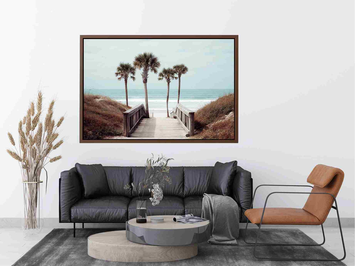 Coastal boardwalk with palm trees and ocean view for relaxed living room decor.