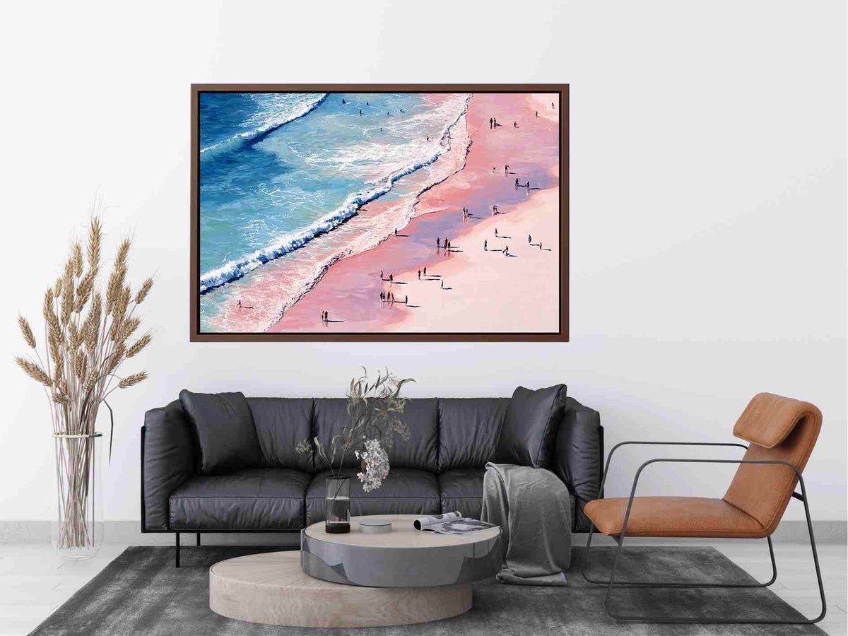Pink shoreline wall art with turquoise waves and beach walkers for modern coastal living room