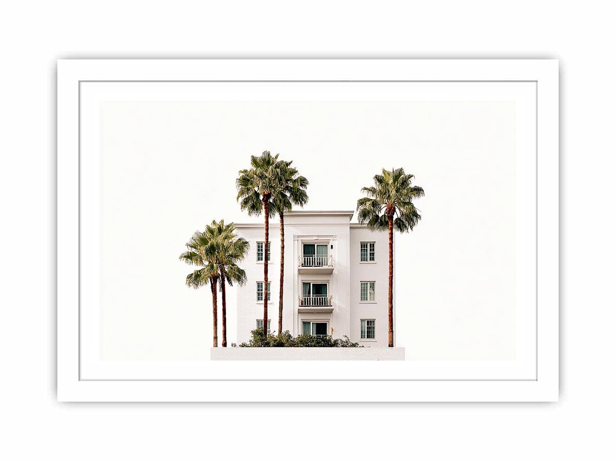 Palm building framed print with white architecture and tall trees for airy office decor