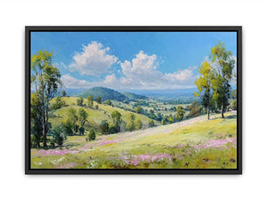 Bright green countryside landscape canvas art with mountains and clouds for peaceful home decor.