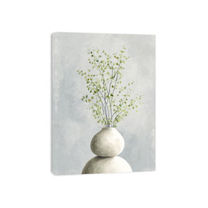 Minimal eucalyptus leaves in white vase canvas art for calm modern bedroom decor.