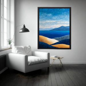 Blue coastal mountain landscape canvas art for serene modern living room decor.