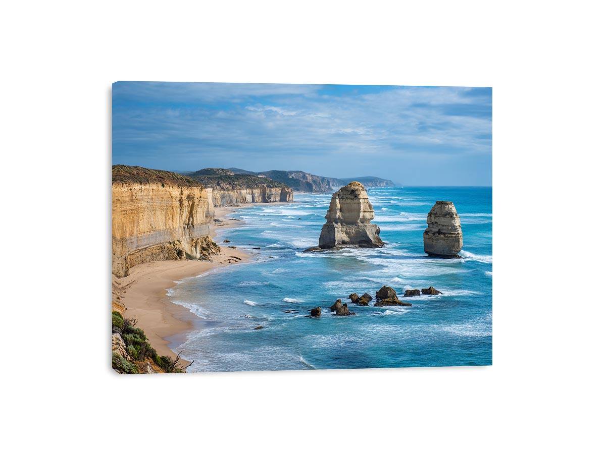 Blue ocean coast with limestone sea stacks canvas art for large living room decor.