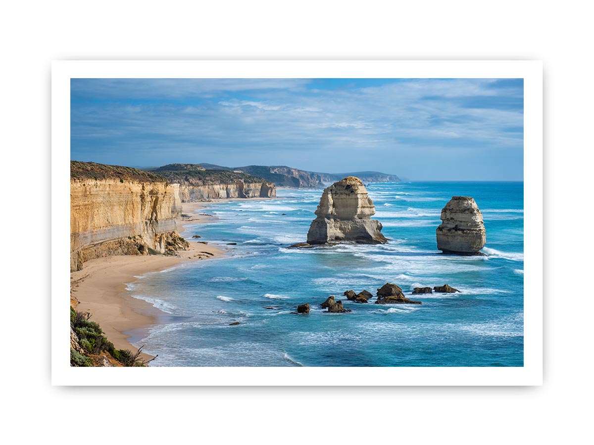 Blue ocean coast with limestone sea stacks canvas art for large living room decor.