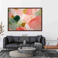 Soft pink abstract floral canvas art with gold accents for modern living room decor.