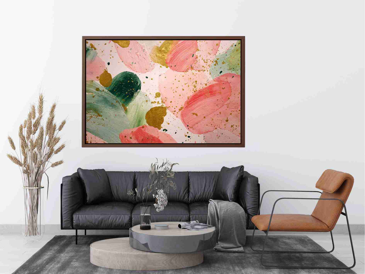 Soft pink abstract floral canvas art with gold accents for modern living room decor.