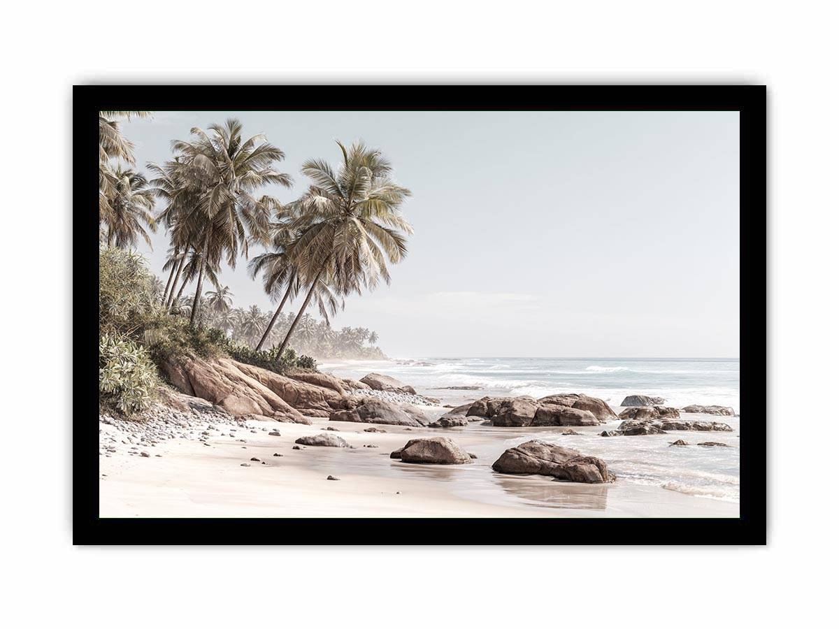 Coastal palm beach canvas photography with ocean and rocks for serene bedroom decor.
