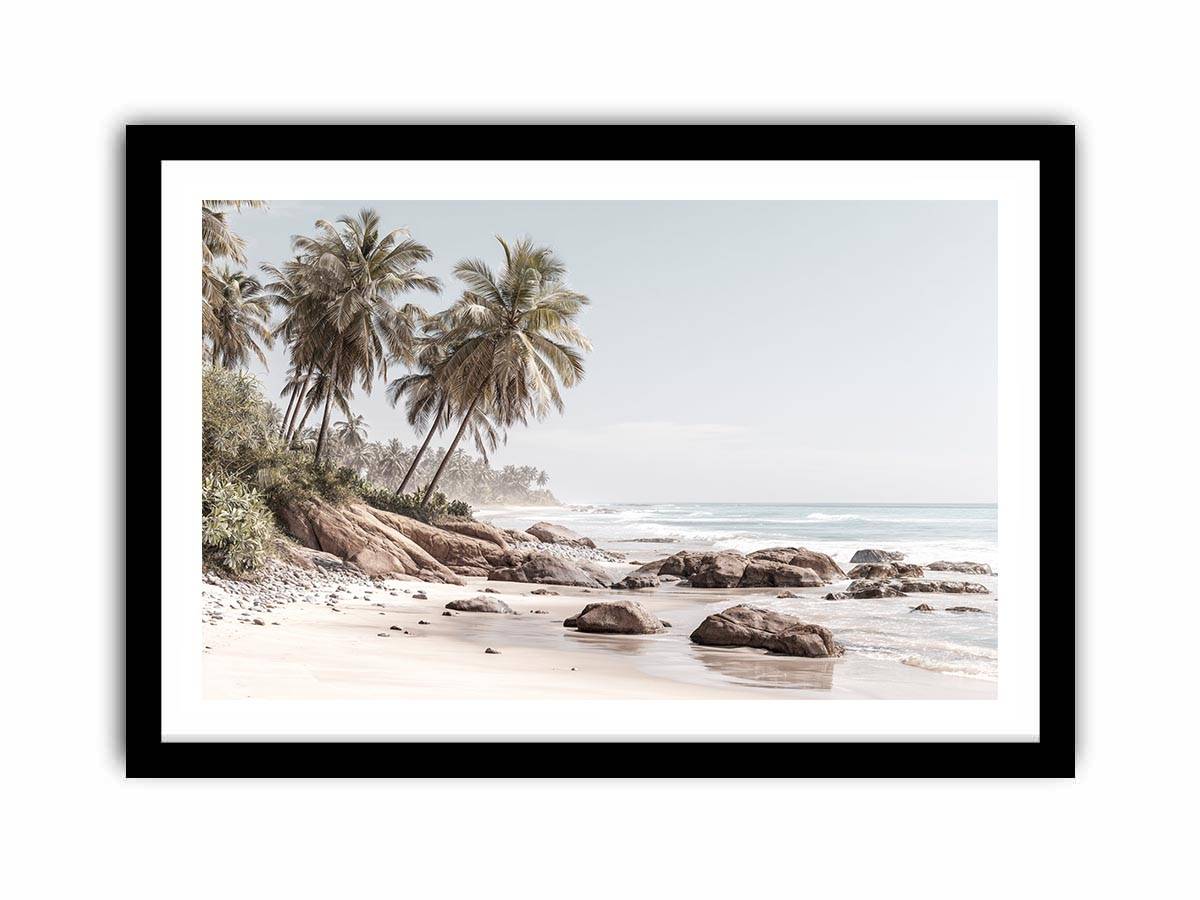 Coastal palm beach canvas photography with ocean and rocks for serene bedroom decor.