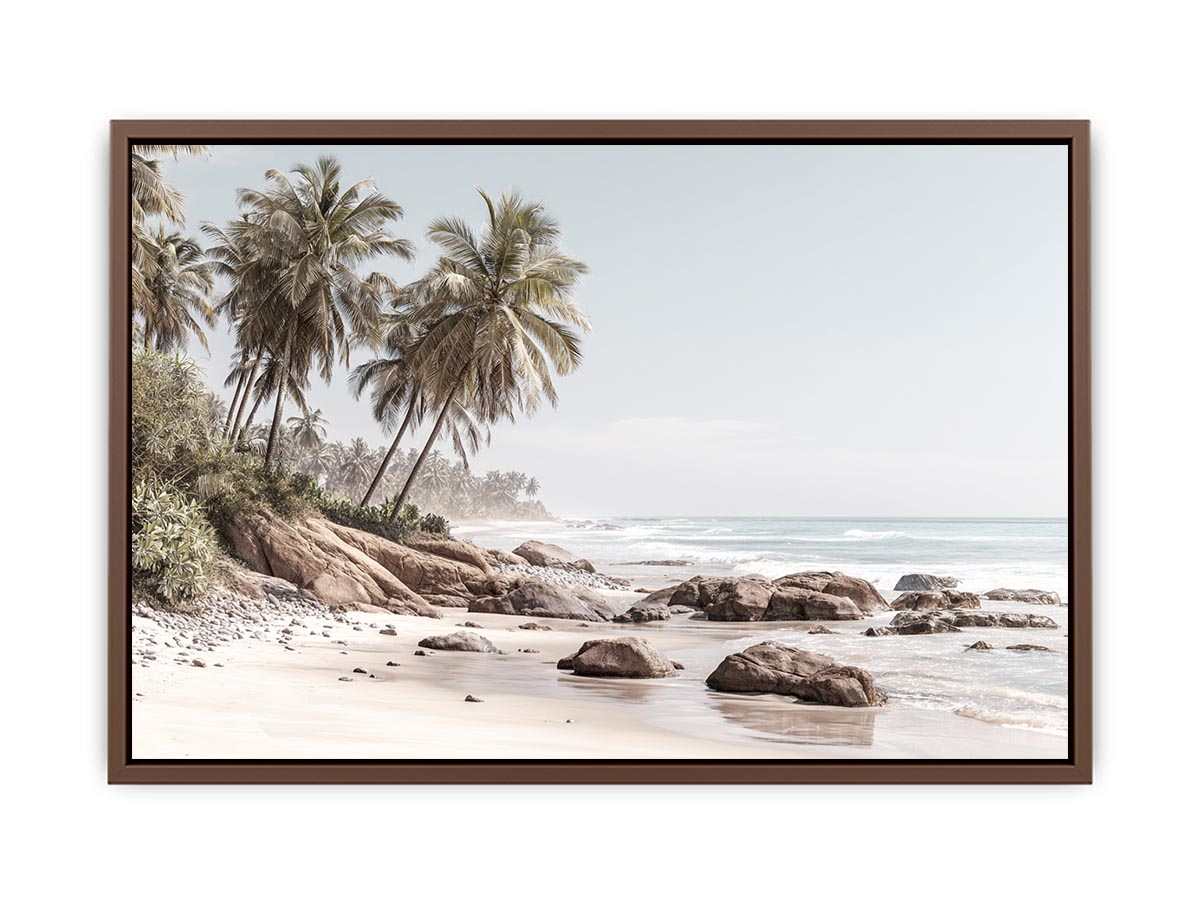 Coastal palm beach canvas photography with ocean and rocks for serene bedroom decor.
