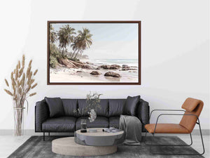 Coastal palm beach canvas photography with ocean and rocks for serene bedroom decor.