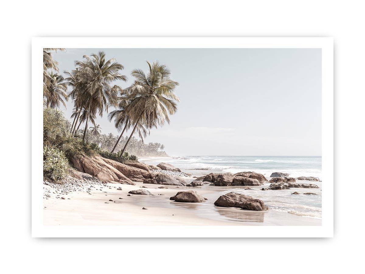 Coastal palm beach canvas photography with ocean and rocks for serene bedroom decor.