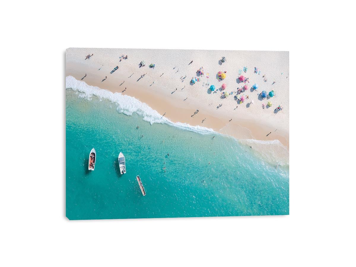 Aerial turquoise beach canvas photography with boats and umbrellas for coastal decor.