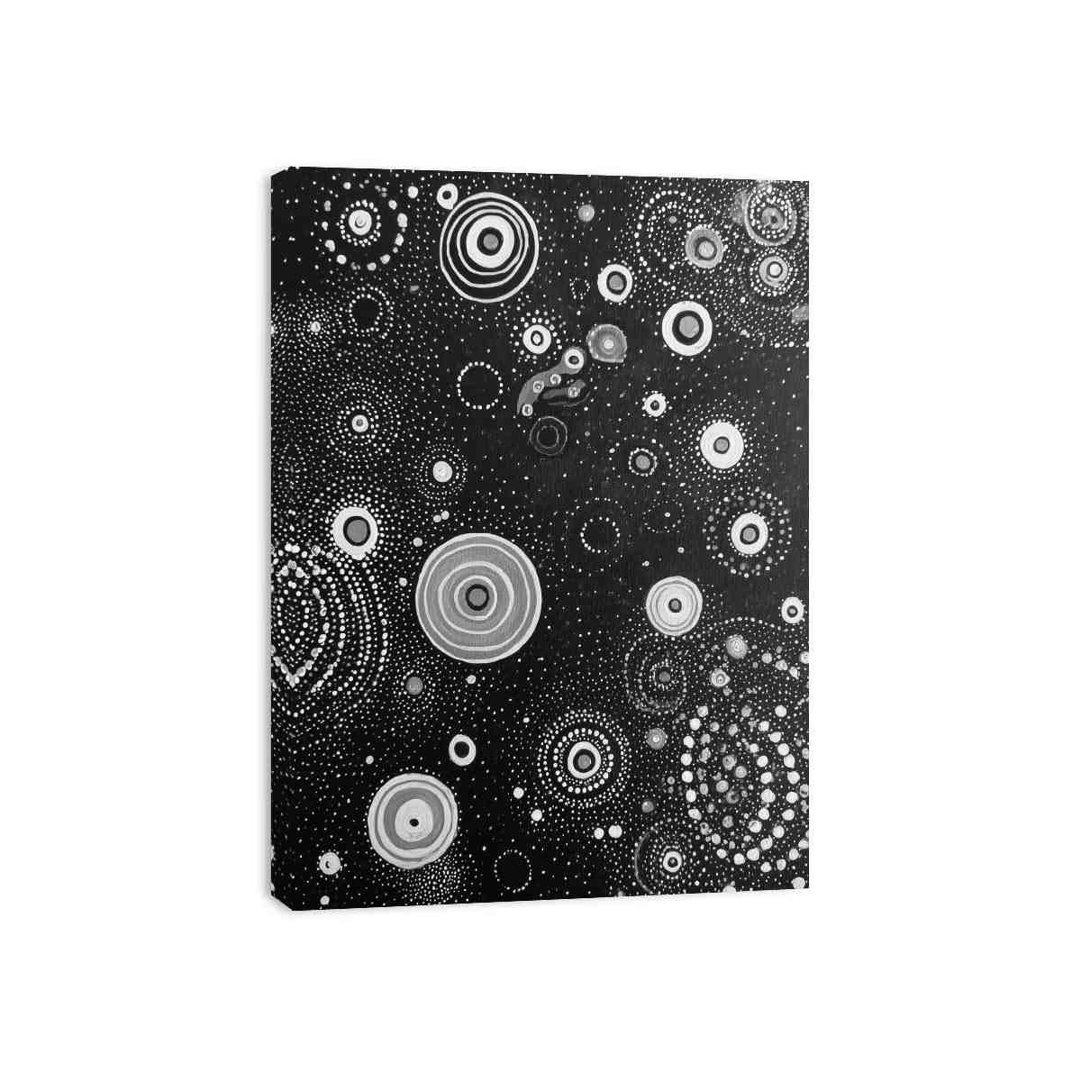 Black and white abstract canvas art with dotted circles for modern living room or office decor.
