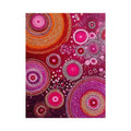 Magenta abstract dot canvas art with orange circular orbits for bold modern wall decor.