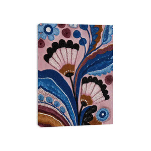 Blue and pink folk floral canvas art with bold leaves for bedroom wall decor.