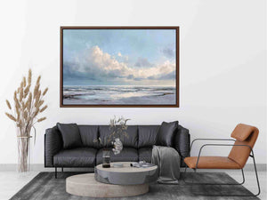 Soft coastal ocean canvas art with pale clouds for calm living room or bedroom decor.