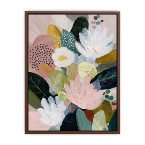 Soft abstract floral canvas art with blush flowers and green leaves for bedroom decor.