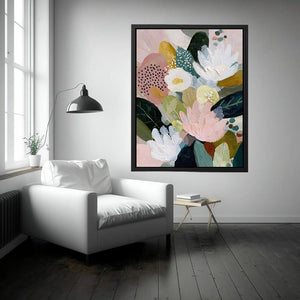 Soft abstract floral canvas art with blush flowers and green leaves for bedroom decor.