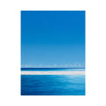Bright turquoise ocean canvas art with white surf and blue sky for coastal bedroom decor.