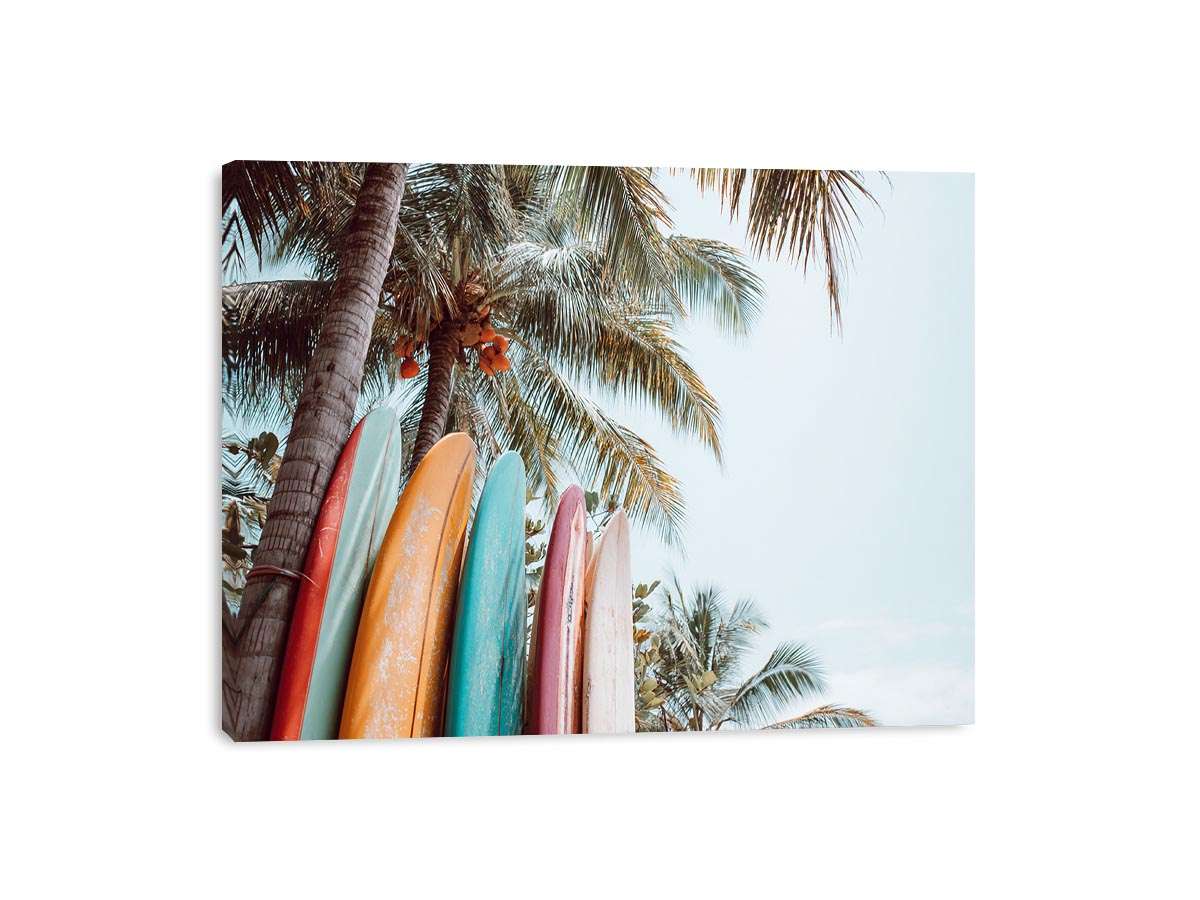 Colorful surfboard palm tree canvas print for tropical coastal decor.